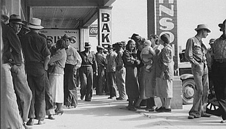 The photograph shows people lined up outside a bank during the Great Depression awaiting their relief checks.