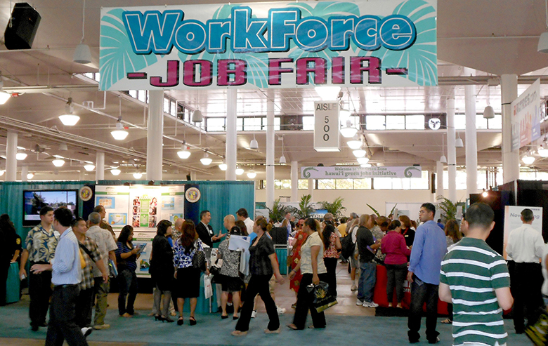 This is a photograph of people at a job fair.