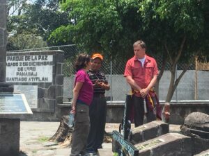 working in Guatemala - three people talking