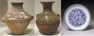 Three pots; the first is earth colored, the second is brown and shiny, and the third is white with blue paint.
