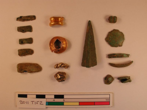 A series of small metal artifacts.
