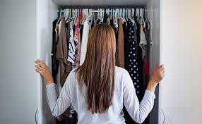 Girl looking in closet